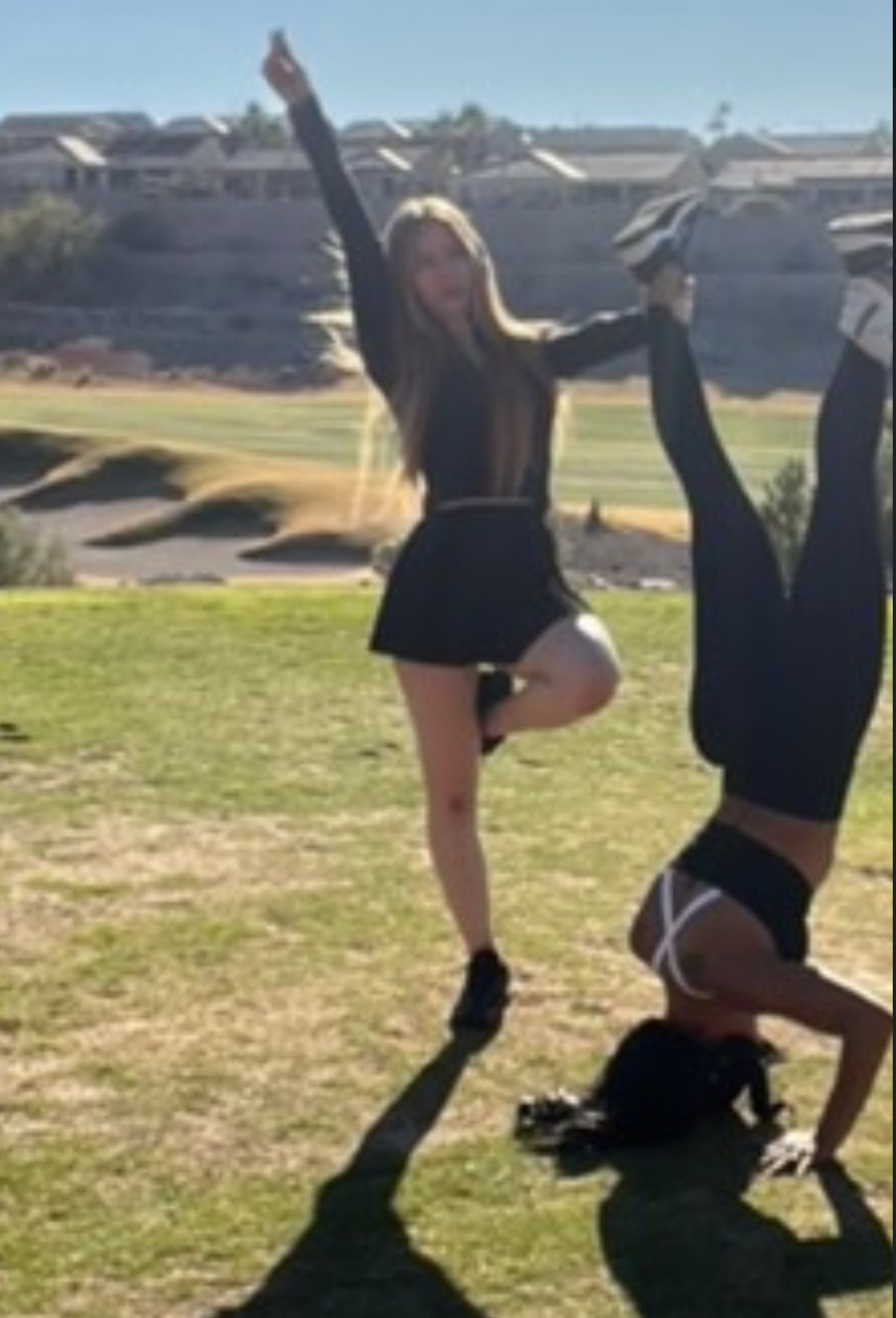 model caddy wearing a skirt on a golf course, cheerful and stylish, Las Vegas setting